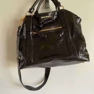 Miu Miu..like Rhianna 😁 brown patent  bag. With dustbag